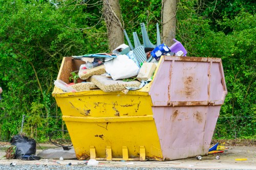 Waste collection truck operating in Highbury neighborhood